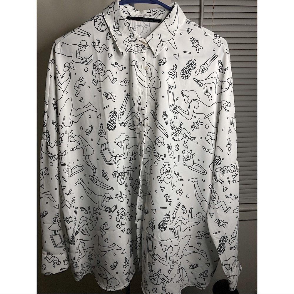 White and black shaped sweater fits L/XL